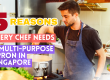 man cooking wearing apron